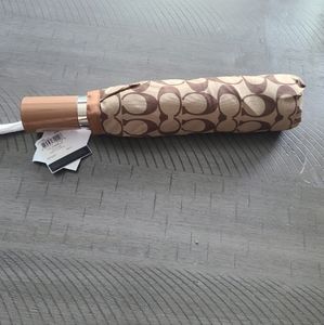 Coach Signature retractable umbrella